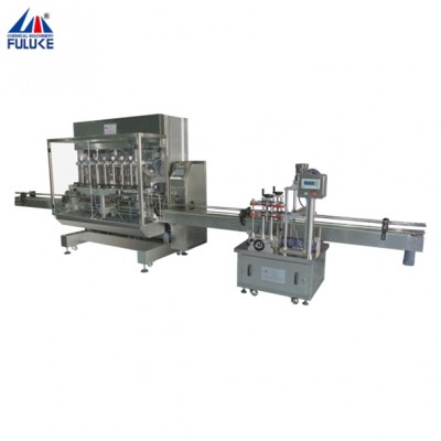 Automatic Liquid Filling, Sealing and Capping Machine